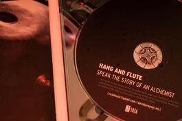 Hang and Flute speak the story of an Alchemist